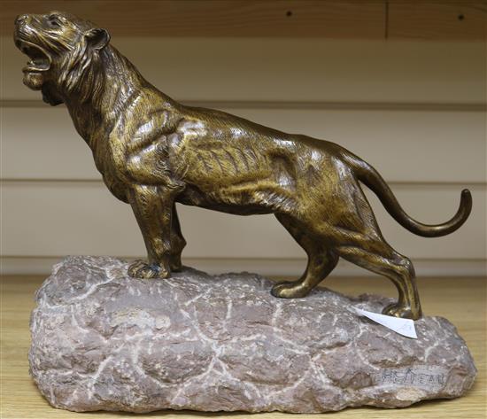 A bronze tiger on stone base, signed Heiteau